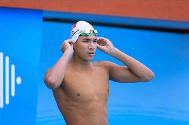 التونسي أحمد الحفناوي يحطم الرقم القياسي العالمي ويحرز يحرز الميدالية الذهبية لسباق 1500م سباحة حرة