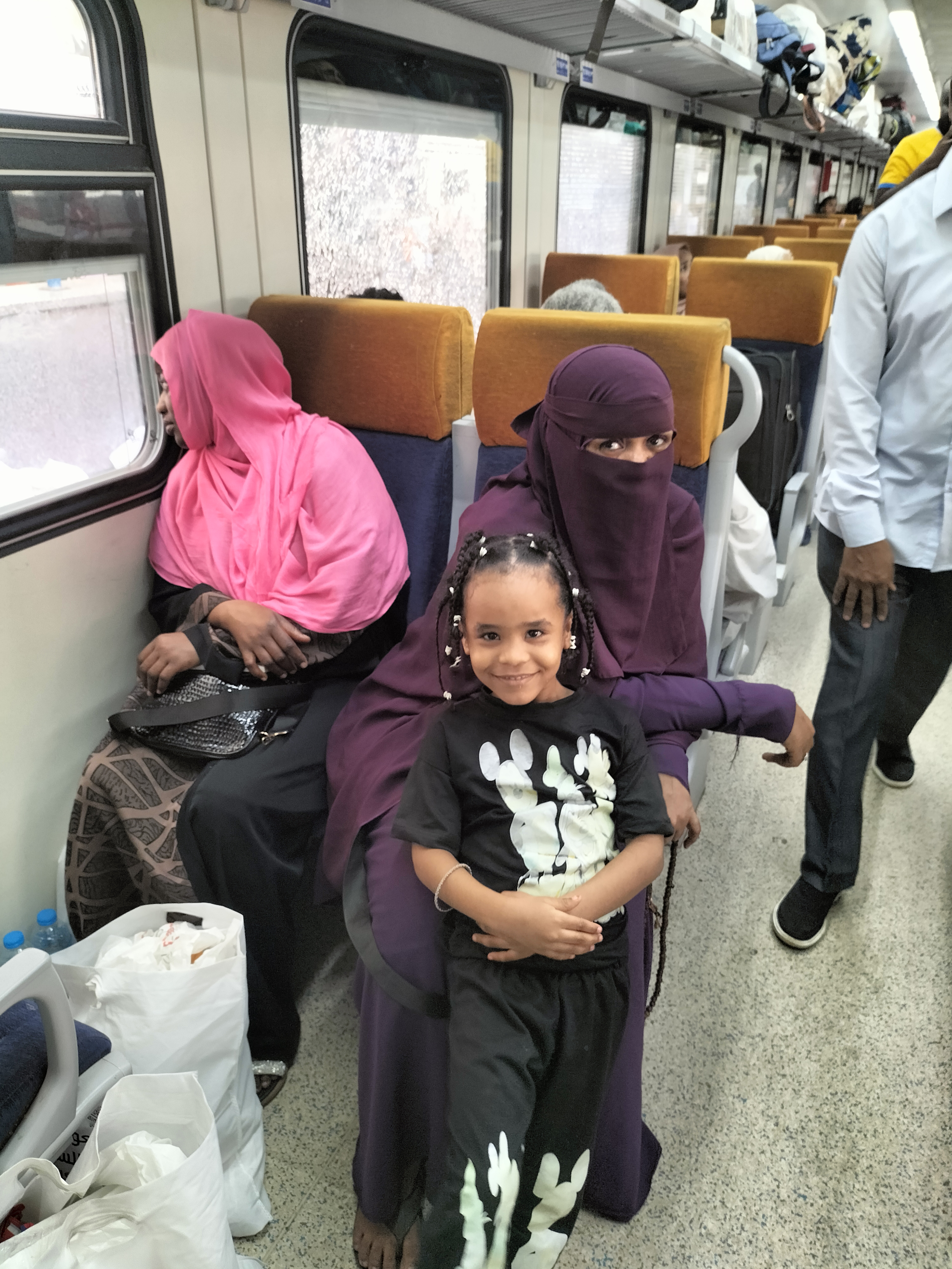 IMG20250820112506 بالصور .. عودة 1500 سوداني من مصر عبر قطار العودة الطوعية السادس