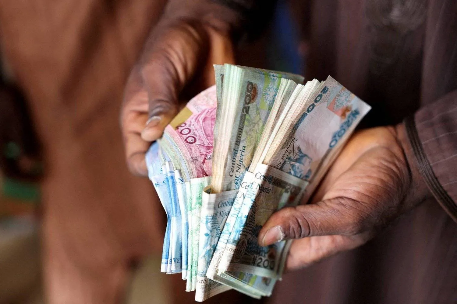 775650.jpeg الدولار والنيرة النيجيرية: تقلص الفارق بين السعر الرسمي والموازي مع أول خفض للفائدة
